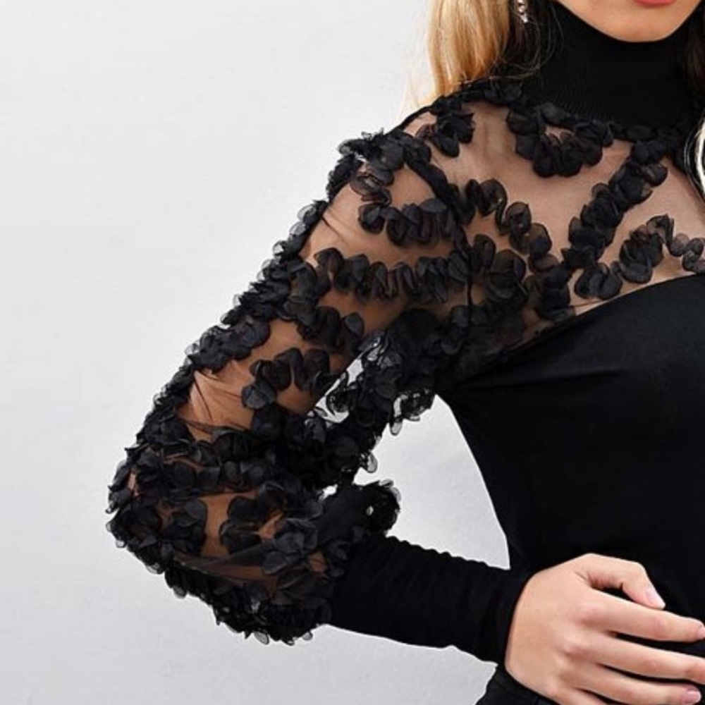 Black sheer ruffle accent turtleneck